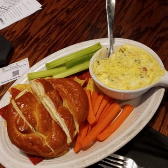Pourhouse - spinach artichoke dip with bread, carrots, and celery - Bars Near Me - Loveland, Colorado Pourhouse - spinach artichoke dip with bread, carrots, and celery - Bars Near Me - Loveland, Colorado