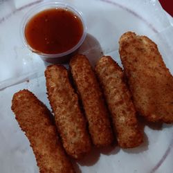 Pino's Pizza & Restaurant - Mozzarella sticks (with red water disguised as marinara sauce)