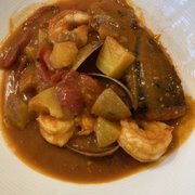 Photo of Bogart's Cafe - Honolulu, HI, United States. BASQUE FISH STEW (from the pot) atlantic salmon, kauai shrimp, smoked paprika, black garlic aioli