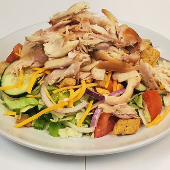 Mad Greek Grill - a salad with chicken, lettuce, tomatoes, cheese, and croutons - Greek Near Me - High Point, North Carolina Mad Greek Grill - a salad with chicken, lettuce, tomatoes, cheese, and croutons - Greek Near Me - High Point, North Carolina