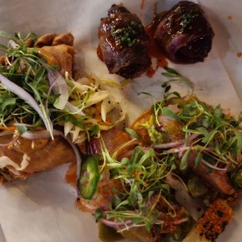 Nunos Bistro & Bar - Tapas Flight: Empanandas, Bacon Wrapped Dates, & Mahi Mahi - Modern European Near Me - Upland, California Nunos Bistro & Bar - Tapas Flight: Empanandas, Bacon Wrapped Dates, & Mahi Mahi - Modern European Near Me - Upland, California