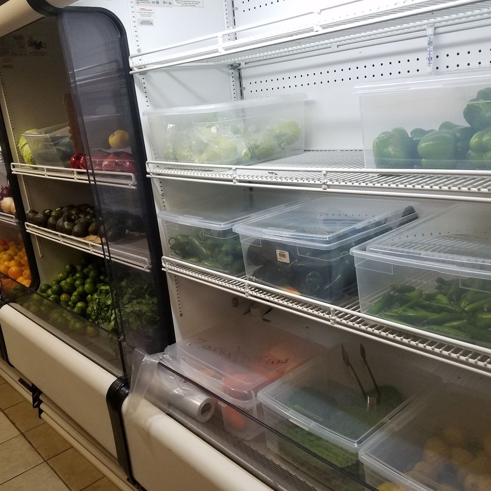 Vega Grocery - a refrigerator full of vegetables and fruits - Grocery Near Me - Indianapolis, Indiana