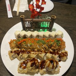 a plate of sushi on a table