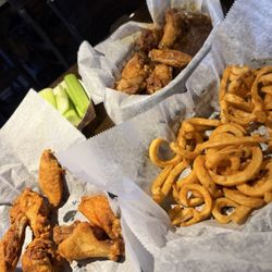 Trees Wings And Ribs - Dry rub and teriyaki garlic chicken wings with a side of curly wings.