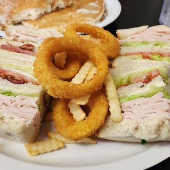 Janet's Cafe and Deli - Turkey club meal with onion rings and fries - New American Near Me - Santee, California Janet's Cafe and Deli - Turkey club meal with onion rings and fries - New American Near Me - Santee, California