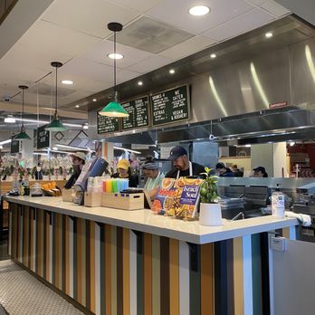 Goldie - a restaurant counter with a man standing at the counter - Fast Food Near Me - Philadelphia, Pennsylvania Goldie - a restaurant counter with a man standing at the counter - Fast Food Near Me - Philadelphia, Pennsylvania
