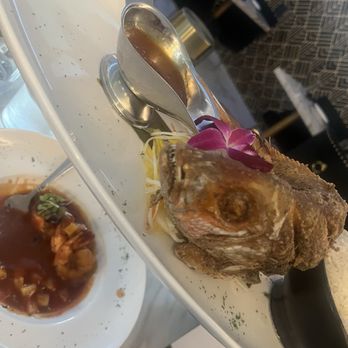 Lilli Restaurant and Bar - Fried whole Snapper, mango sauce on the side. Sweet & Sour Shrimp (below) - Caribbean Near Me - New York, New York Lilli Restaurant and Bar - Fried whole Snapper, mango sauce on the side. Sweet & Sour Shrimp (below) - Caribbean Near Me - New York, New York