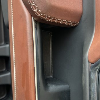 Thompson Chevrolet Buick GMC - Grease Stains On Leather and white stitching. The area by window switches was cleaned to verify the grease on the door handle area. - Car Dealers Near Me - Patterson, California Thompson Chevrolet Buick GMC - Grease Stains On Leather and white stitching. The area by window switches was cleaned to verify the grease on the door handle area. - Car Dealers Near Me - Patterson, California