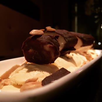 Aha Sushi Bistro - Nutty Monkey dessert! Banana covered with chocolate, vanilla ice cream and almonds. DELICIOUS!!!!! - Japanese Near Me - Gurnee, Illinois Aha Sushi Bistro - Nutty Monkey dessert! Banana covered with chocolate, vanilla ice cream and almonds. DELICIOUS!!!!! - Japanese Near Me - Gurnee, Illinois