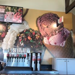 Braum's Ice Cream & Dairy Stores - Braum's ice cream wall collage; soda station and ordering bar (to the right)