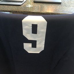 the number 9 on the shirt