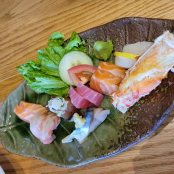 Kobo Gourmet - a plate of food on a wooden table - Japanese Near Me - Pickering, Ontario Kobo Gourmet - a plate of food on a wooden table - Japanese Near Me - Pickering, Ontario