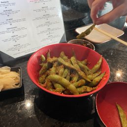Spicy garlic edamame. Messy fingers but a step up from regular.