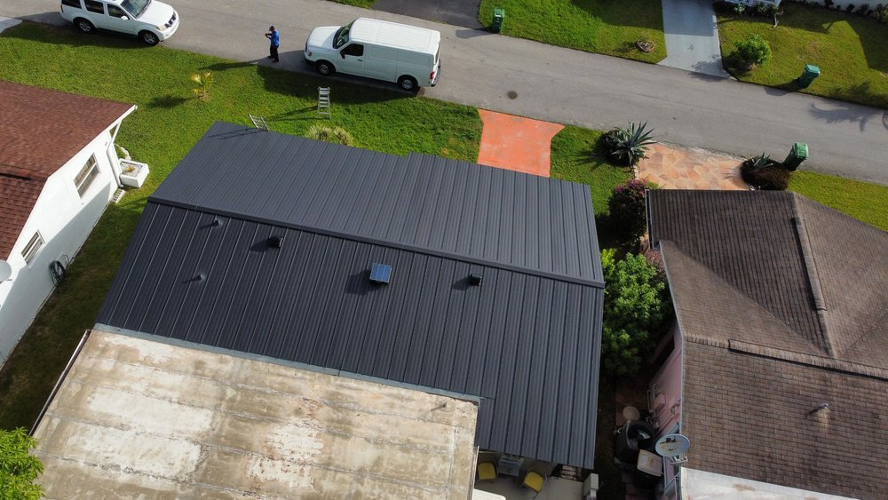 Slide of Dream Team Roofing