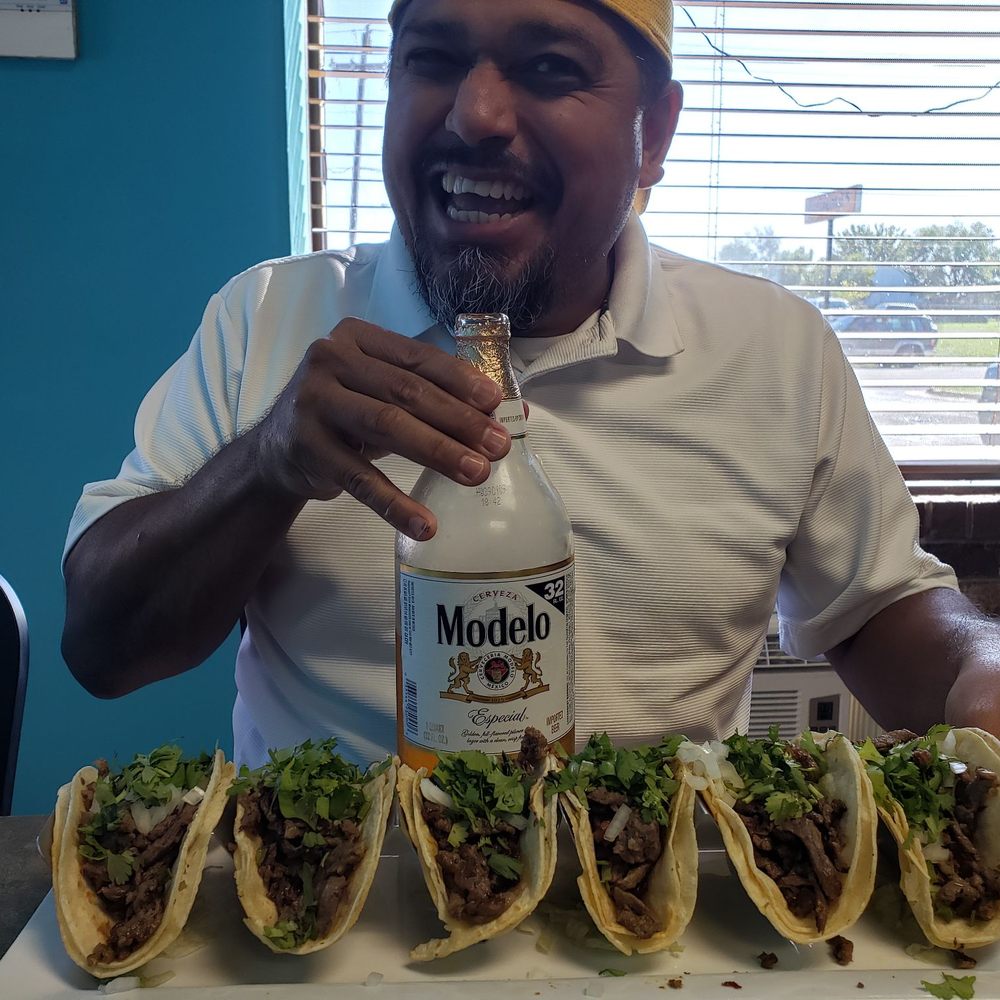 Carne Asada tacos and the nectar of the gods, Modelo with lime and salt! You know if a Mexican is eating here it's authentic! Carne Asada tacos and the nectar of the gods, Modelo with lime and salt! You know if a Mexican is eating here it's authentic!