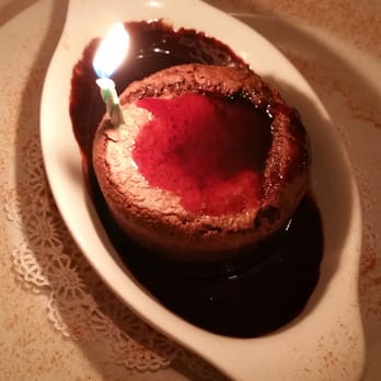 Salt Cellar - Chocolate lava cake with raspberry sauce and ganache - Seafood Near Me - Scottsdale, Arizona Salt Cellar - Chocolate lava cake with raspberry sauce and ganache - Seafood Near Me - Scottsdale, Arizona