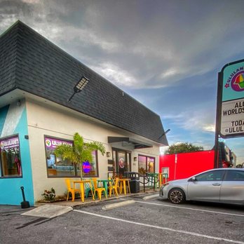 Ululani´s Hawaiian Shave Ice - Facade showing signage, outside seating and entrance from parking lot. - Shaved Ice Near Me - Seminole, Florida Ululani´s Hawaiian Shave Ice - Facade showing signage, outside seating and entrance from parking lot. - Shaved Ice Near Me - Seminole, Florida