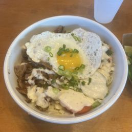 Entrée Bowl with pork and nom nom sauce Entrée Bowl with pork and nom nom sauce