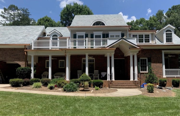 Slide of Gutter Guys Construction