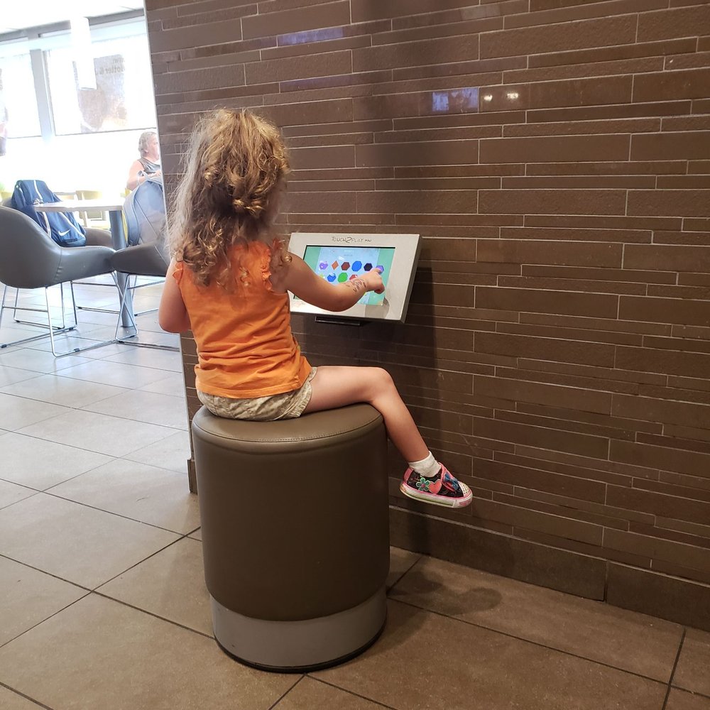 My daughter playing on tablet. My daughter playing on tablet.