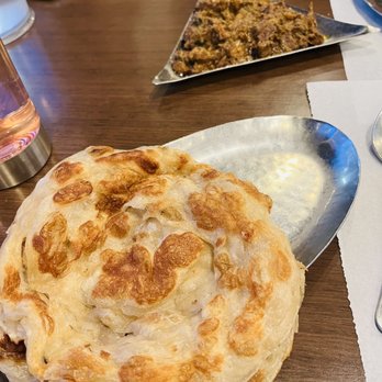 Dindigul Thalappakatti Restaurant - PAROTTA - 1PC - Indian Near Me - Milpitas, California Dindigul Thalappakatti Restaurant - PAROTTA - 1PC - Indian Near Me - Milpitas, California