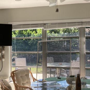 Classic Window Film - Prepping and applying film on our lanai. - Home Window Tinting Near Me - Port Richey, Florida Classic Window Film - Prepping and applying film on our lanai. - Home Window Tinting Near Me - Port Richey, Florida