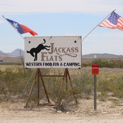 Little Burro Country Store - Jackass Flats sign at road