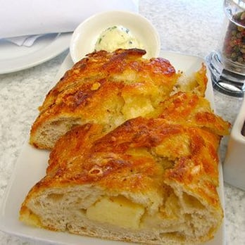Wildflower - house bread...parmesan + garlic butter!!! - New American Near Me - Tucson, Arizona Wildflower - house bread...parmesan + garlic butter!!! - New American Near Me - Tucson, Arizona