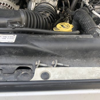 Burlington Chrysler Dodge Jeep RAM - two screws that are supposed to be screwed in the empty circle to the top left. just left hanging out. - Auto Repair Near Me - Burlington, New Jersey
