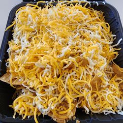 Bad Hombres Good Mexican Food - Chips w/ cheese. Bummer the cheese wasn't melted on the chips....