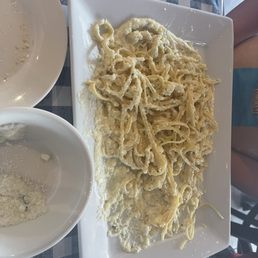 Giant portions!! This is fettuccine Alfredo and is about half what the original serving was!