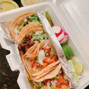 Tiki Taco - a close up of a taco in a styrofoam container - Mexican Near Me - North Charleston, South Carolina Tiki Taco - a close up of a taco in a styrofoam container - Mexican Near Me - North Charleston, South Carolina