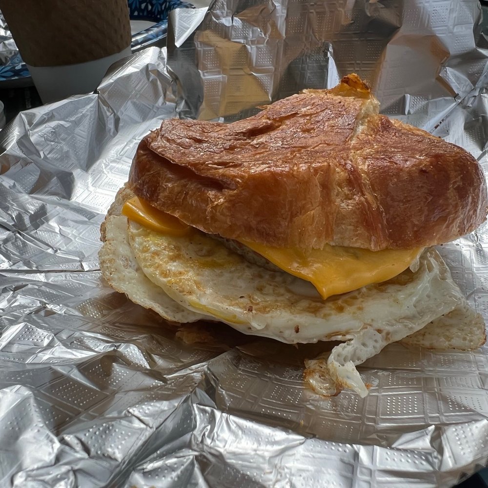 7th Ave Cafe - Sausage egg croissant sandwich with cheese. - Coffee & Tea Near Me - Myrtle Beach, South Carolina