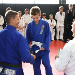 Hayabusa Training Centre - Brazilian Jiu-Jitsu Blackbelt instructor, Luke Harris grading student during Kids Brazilian Jiu-Jitsu (BJJ) Ages 6-15 years old.