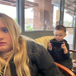 Desert Grove Family Medical - The front desk receptionist was absolutely rude and disrespectful slamming the glass window in my face all while rolling her eyes.
