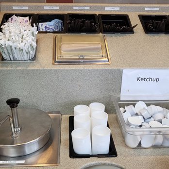 Taco Time - Ketchup and Hot Sauce station with utensils - Mexican Near Me - Tumwater, Washington Taco Time - Ketchup and Hot Sauce station with utensils - Mexican Near Me - Tumwater, Washington