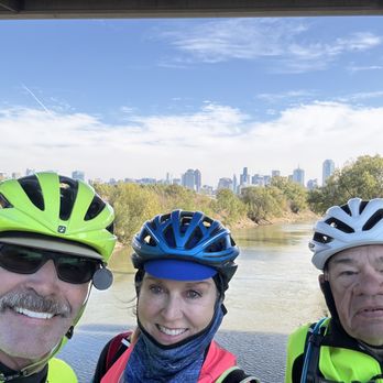 Ronald Kirk Pedestrian Bridge - Dan, Pam and Rob w/Dallas skyline. - Landmarks & Historical Buildings Near Me - Dallas, Texas Ronald Kirk Pedestrian Bridge - Dan, Pam and Rob w/Dallas skyline. - Landmarks & Historical Buildings Near Me - Dallas, Texas