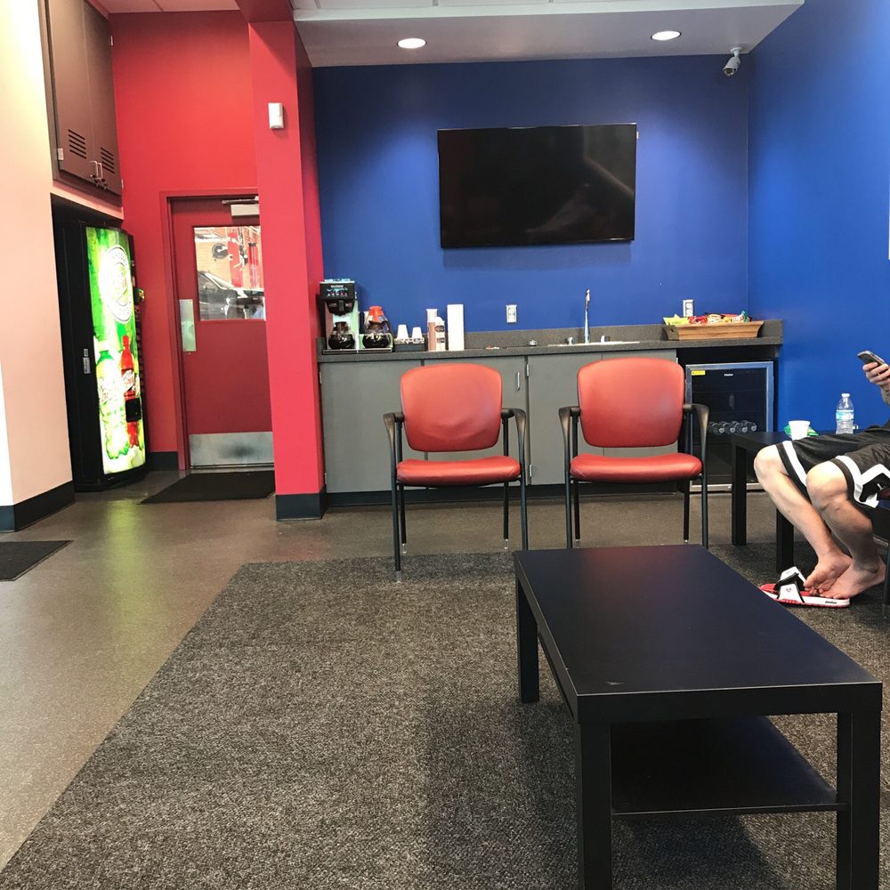 There is even a place with free snacks, water, and comfortable seating with tv if you have to wait for your vehicle to get done