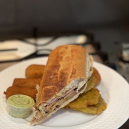 Our Signature Cuban Sandwich Our Signature Cuban Sandwich