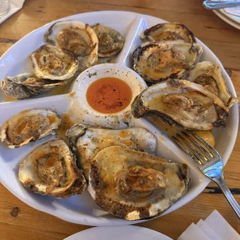 Black Oyster Cocktail - Char-broiled oysters, garlic butter and spices - Seafood Near Me - Newark, New Jersey