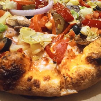 MOD Pizza - Thick crust on half the pizza though I requested thin... it's okay though because the pizza was FANTASTIC! - Fast Food Near Me - Layton, Utah