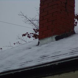 Phil's Roofing - Chimney with missing flashing
