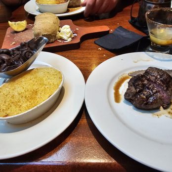 Cherokee Grill - 7oz filet medium rare, Neva's potatoes, burgundy mushrooms, caramel appletini - Steakhouses Near Me - Gatlinburg, Tennessee Cherokee Grill - 7oz filet medium rare, Neva's potatoes, burgundy mushrooms, caramel appletini - Steakhouses Near Me - Gatlinburg, Tennessee