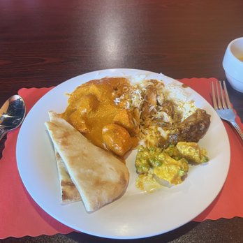 Kathmandu Indian Cuisine - Naan, chicken tikka masala, curry chicken and paneer aloo. Dal soup and basmati rice. - Indian Near Me - Sioux Falls, South Dakota Kathmandu Indian Cuisine - Naan, chicken tikka masala, curry chicken and paneer aloo. Dal soup and basmati rice. - Indian Near Me - Sioux Falls, South Dakota