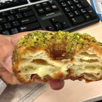 Kettle Glazed Doughnuts - Cream filling inside this pistachio croughnut is devine. - Donuts Near Me - Hollywood, California