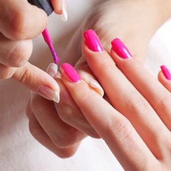 Bellaggio Nail and Spa - My nail tech is applying pink polish on my nails - Nail Salons Near Me - Indio, California Bellaggio Nail and Spa - My nail tech is applying pink polish on my nails - Nail Salons Near Me - Indio, California