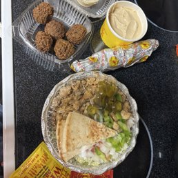 Side of hummus, small chicken platter, Catering White Sauce Pouch, red Hot Sauce Packet To-G0, 6 - Pieces Falafel with tahini sauce Side of hummus, small chicken platter, Catering White Sauce Pouch, red Hot Sauce Packet To-G0, 6 - Pieces Falafel with tahini sauce