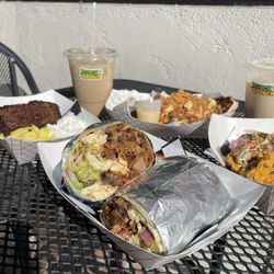 Hangover burrito, grilled banana bread( left) Lilikoi pancake(back) veggie Sunrise (right)