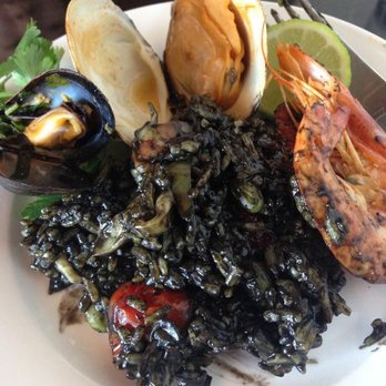 Surfish Bistro - Black Paella on my plate, with lots and lots of seafood :) - Latin American Near Me - Brooklyn, New York