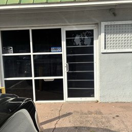 Exterior photo of Houn’s Cuts & Trim - Pensacola, Florida Exterior photo of Houn’s Cuts & Trim - Pensacola, Florida